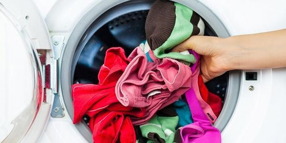 Không đè nén quần áo khi giặt