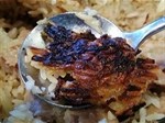 Vì sao nấu cơm ở nồi cơm điện lại bị cháy bén ở đáy nồi?