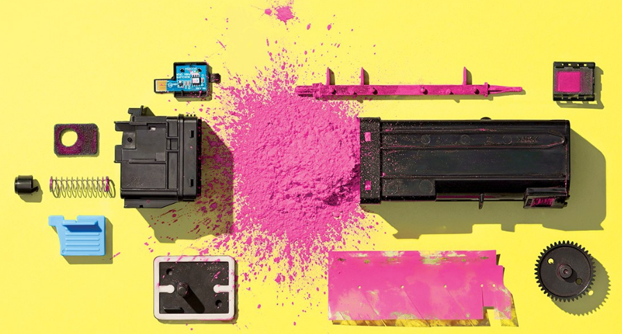 Toner cartridge dạng bột.
