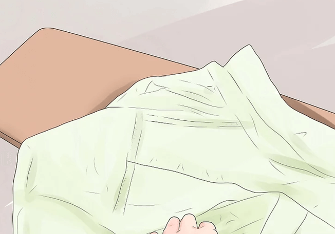 Ủi phần vai và nách áo sơ mi