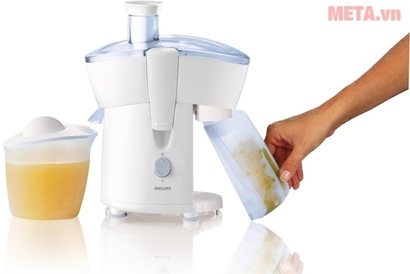 Tháo bình đựng bã xơ ra khỏi máy