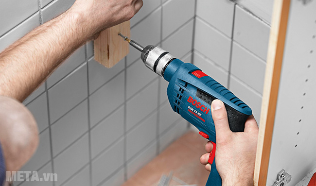 Máy khoan động lực Bosch GSB 13 RE (gồm bộ set)