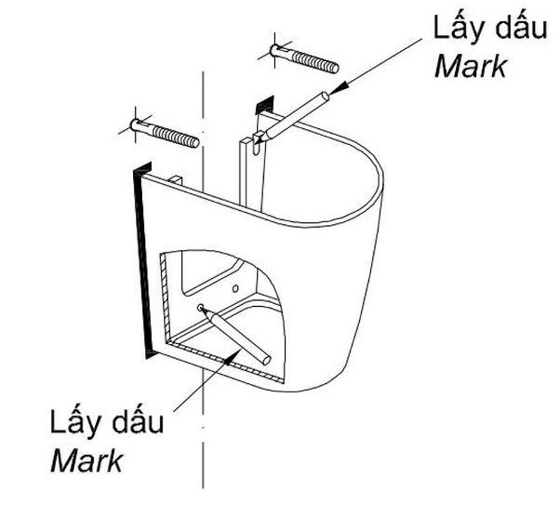 Tiếp tục dùng bút màu đánh dấu vị trí lắp cố định thân lavabo chân lửng
