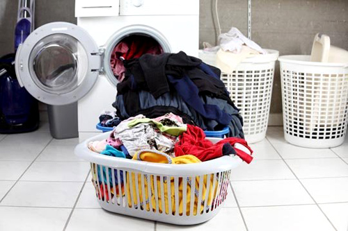 Máy giặt LG kêu tít tít liên tục do quá tải