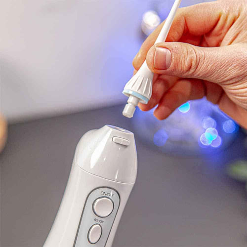 Lắp đầu tăm vào máy 