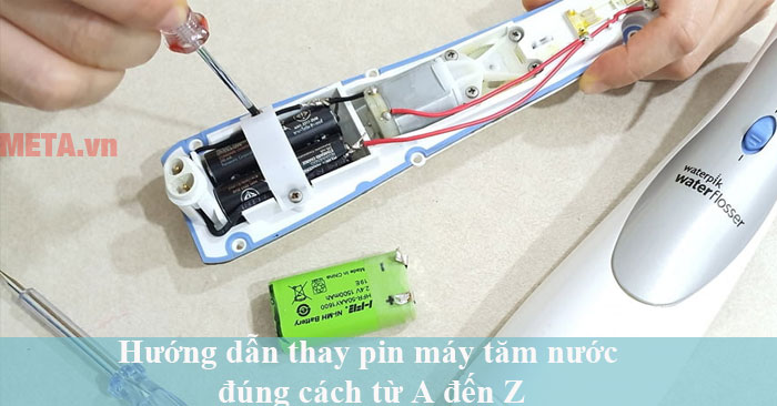 cách thay pin máy tăm nước