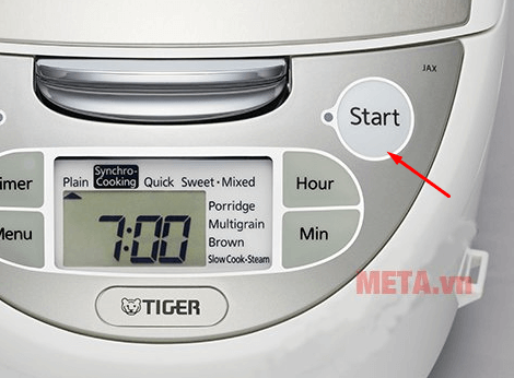 Nhấn nút Start để nồi cơm điện Tiger khởi động chương trình nấu